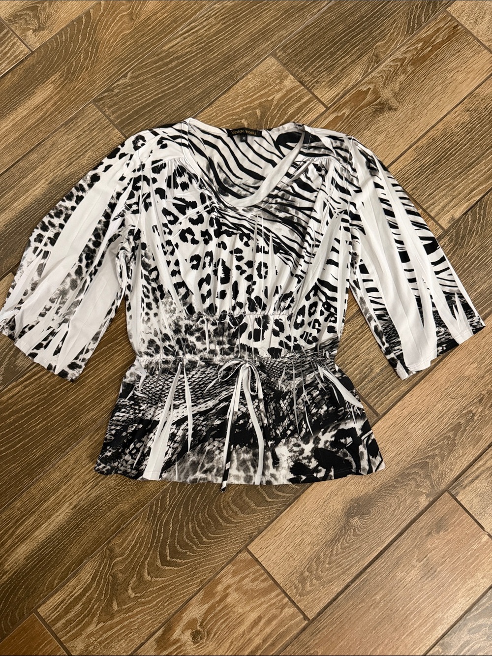 Black & White Mixed Animal Print Peplum Blouse